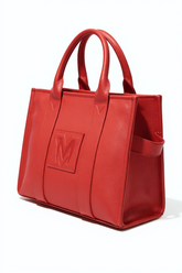 Red handbag with a visible logo on a white background